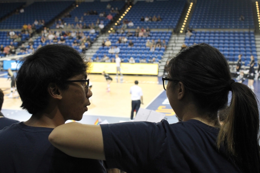 Boy and girl talk to each other.