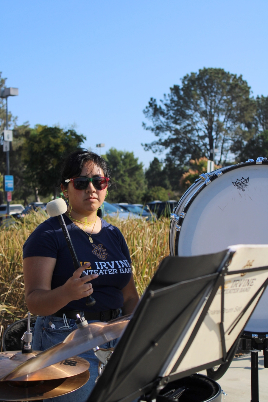 Girl playing the bass drum.