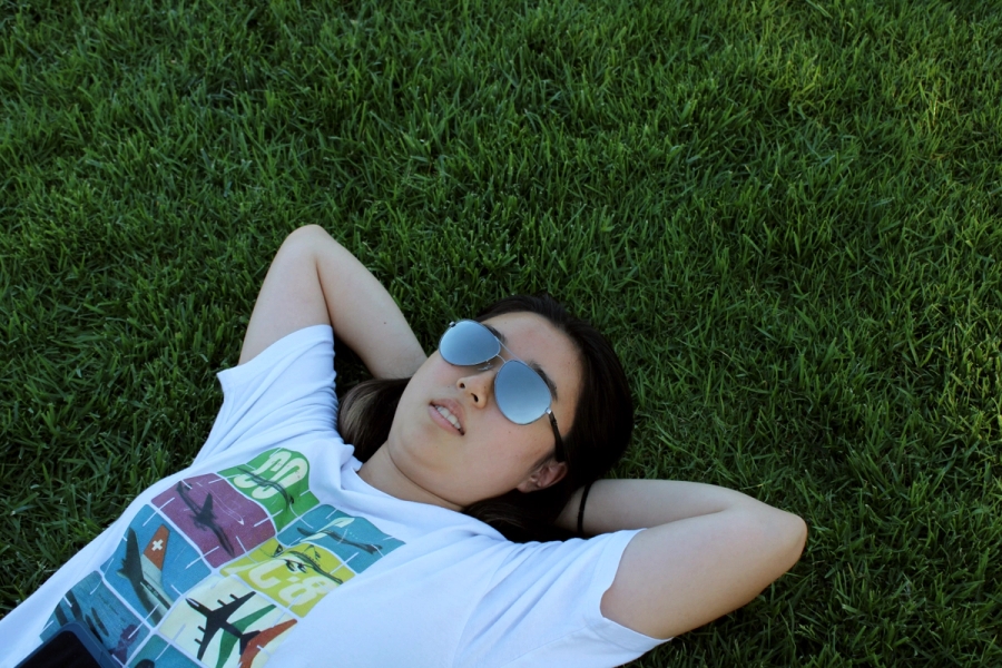 Asian girl wearing shades.