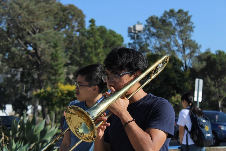 Boy playing trombone.