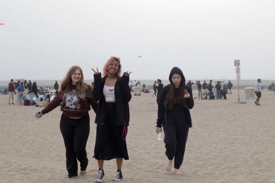 Three girls walking.