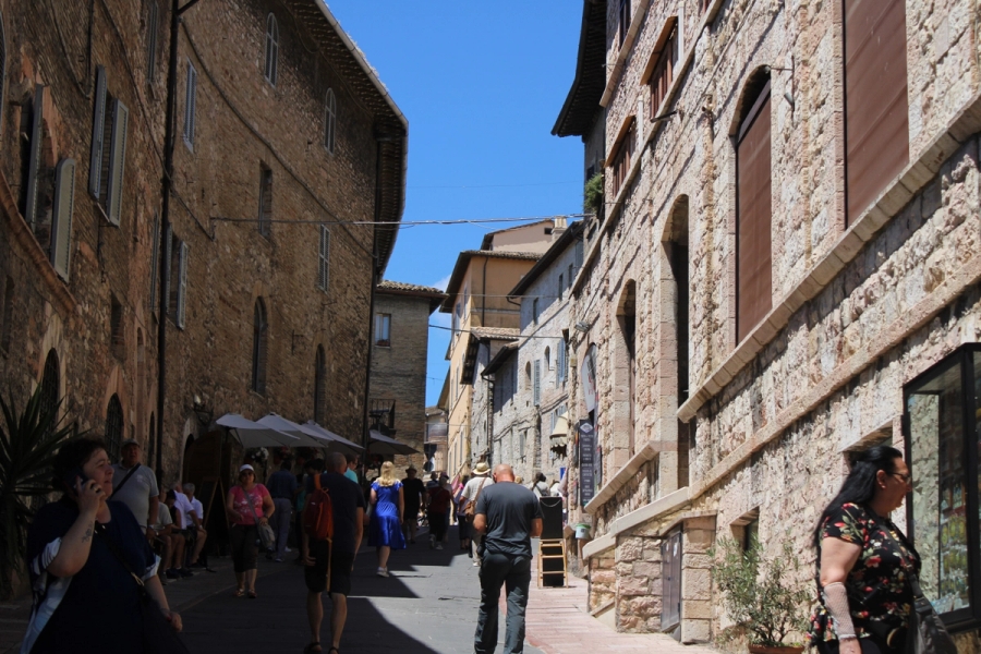 Uphill in between buildings.