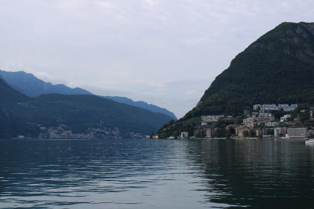 Buildings at the bottom of hills.