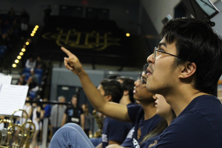 Man staring at Jumbotron.