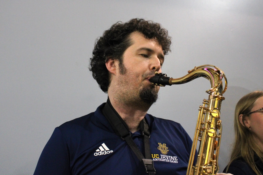 Man playing tenor sax.