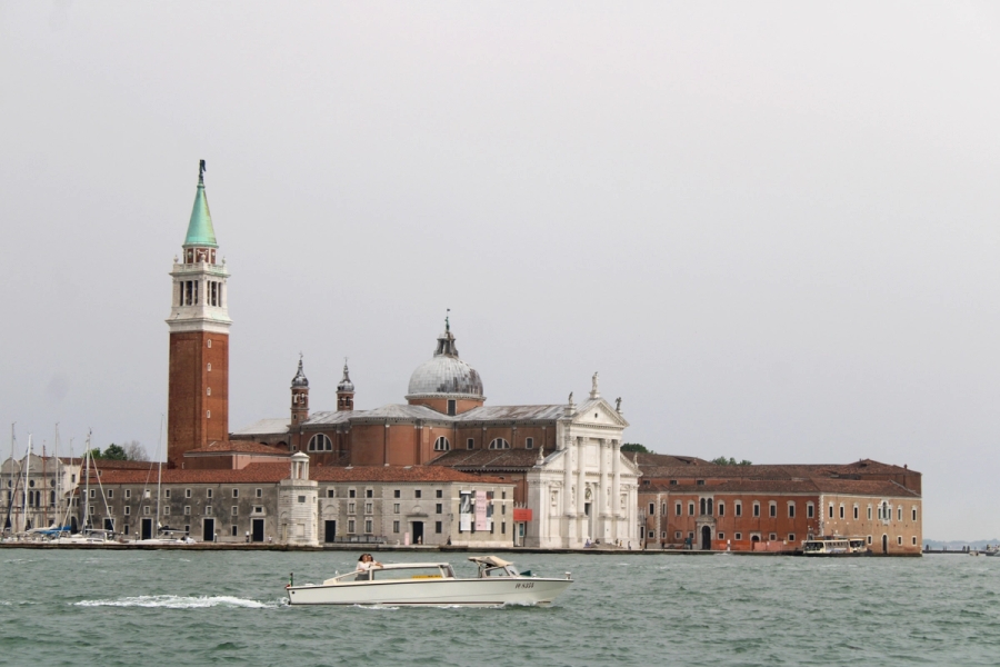 Building and boat on the water.