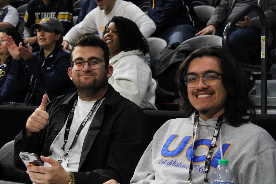 Two guys supporting UCI.