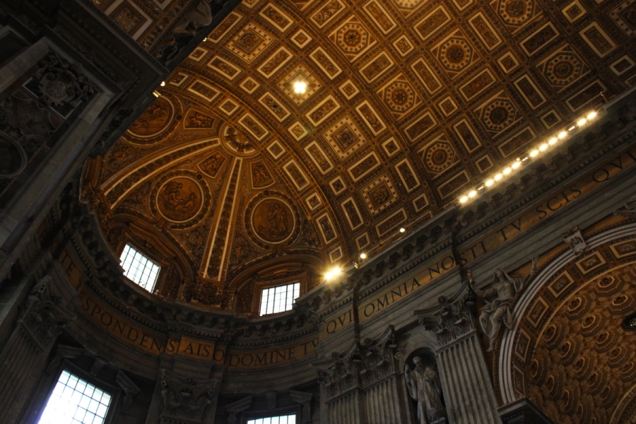 Low angled POV of arch ceiling.