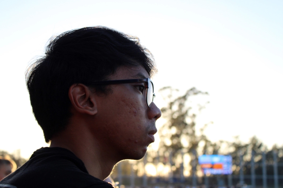Boy staring at right.