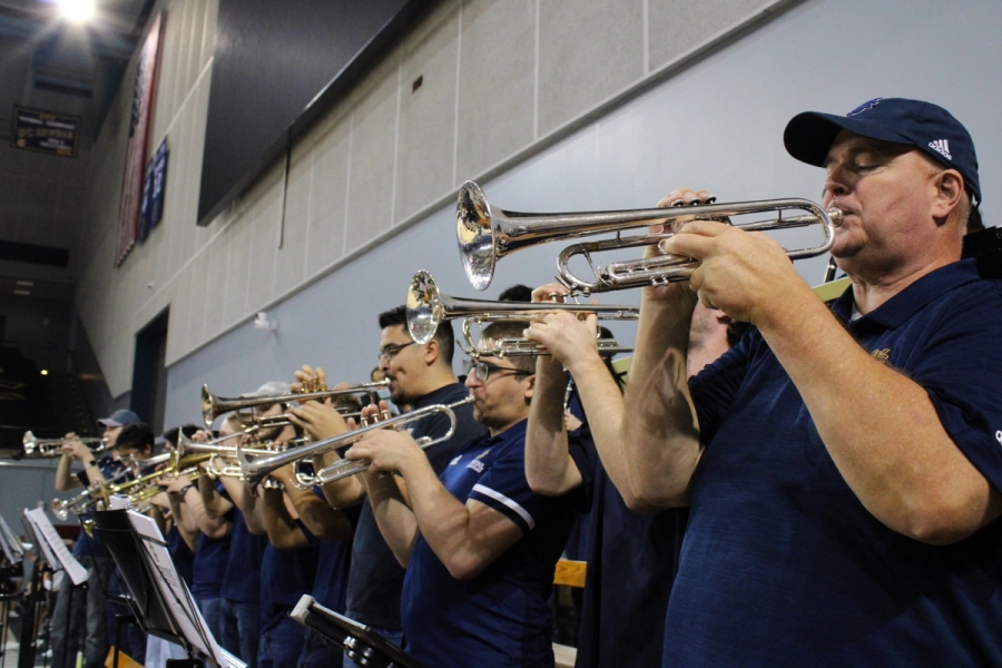 Side low POV of trumpets.