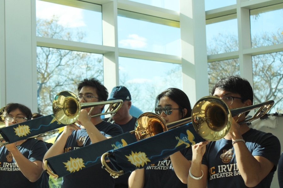 Front POV of trombones playing.