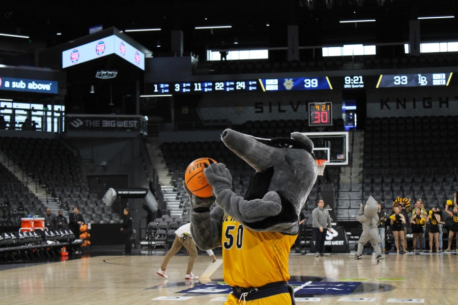Peter shooting a basketball.