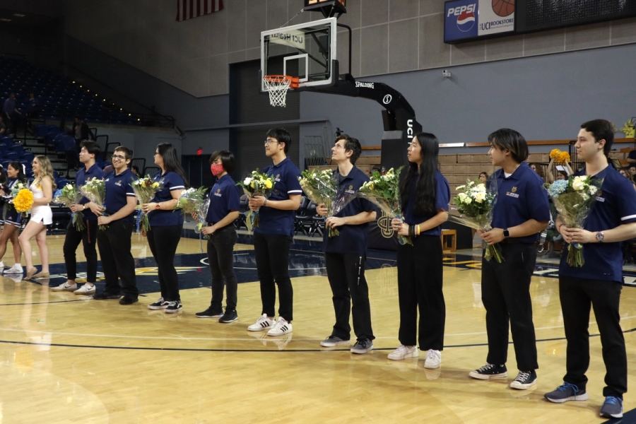 Band seniors looking at the court.