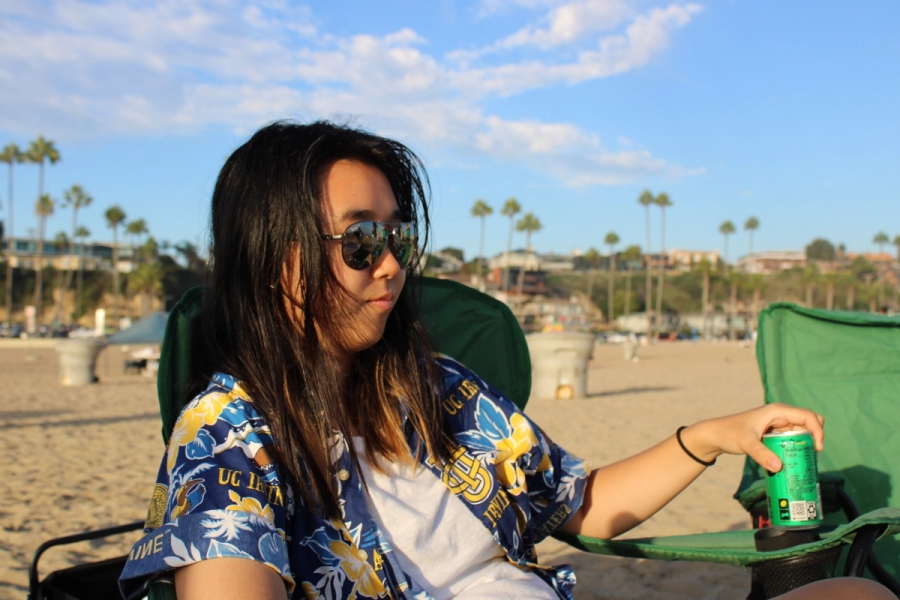 Girl drinking a soda.