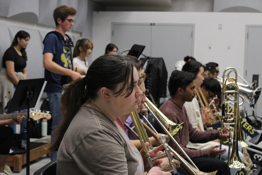 Girl waiting to play trombone.