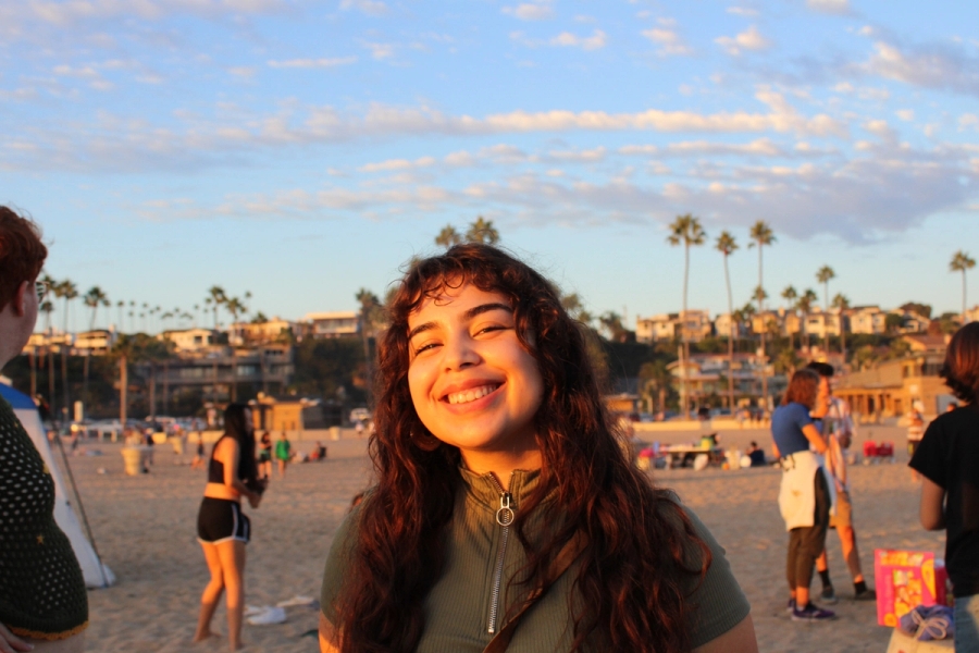 Girl smiling at golden hour.
