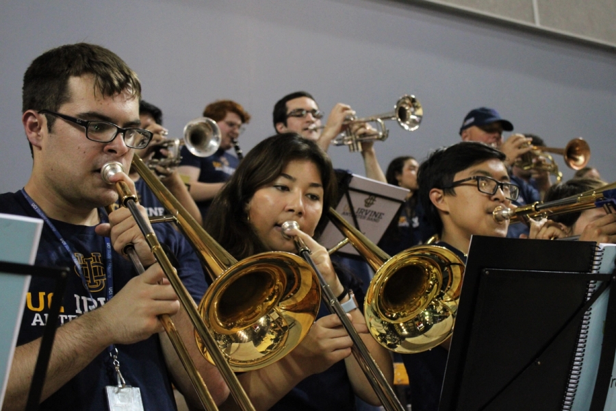 Low front POV of three trombones.
