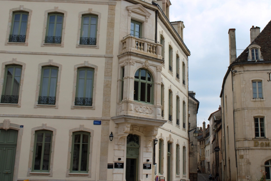 Building at corner of intersection.