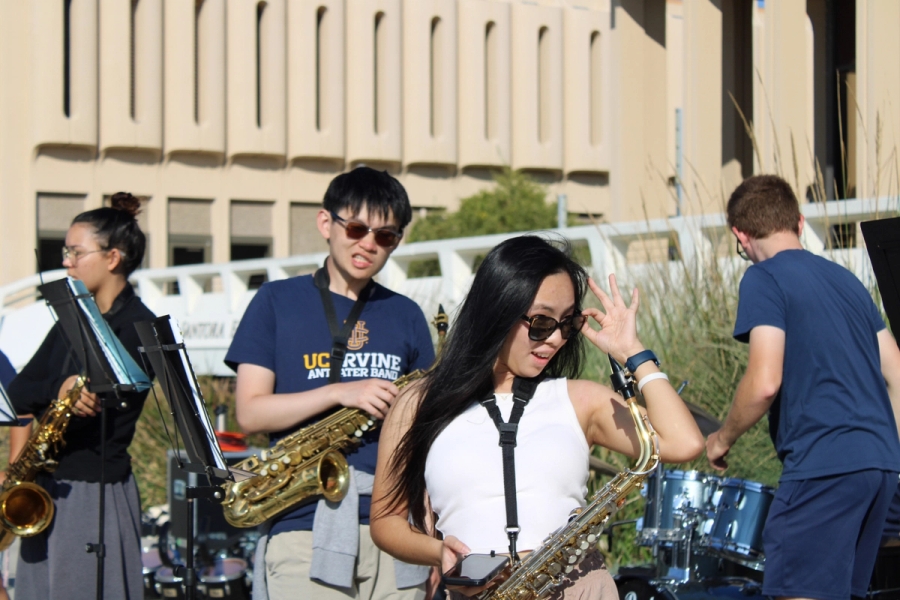 Girl with alto saxophone.