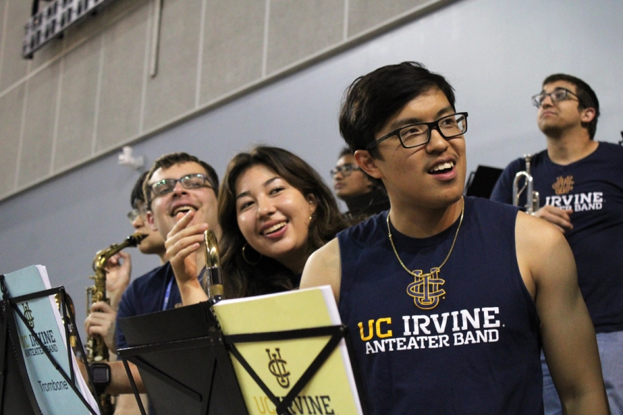 Three trombones react to something on the right.