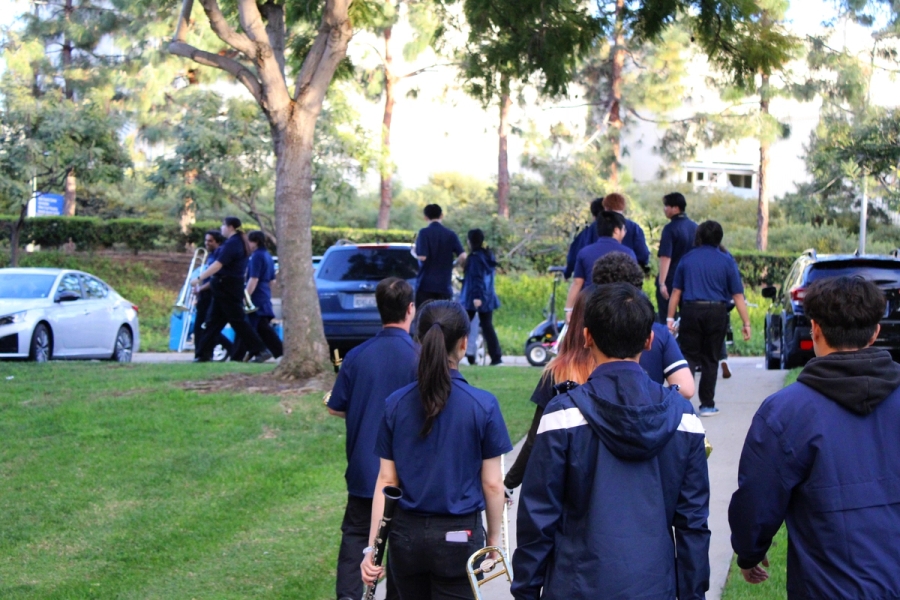 Band members walking.