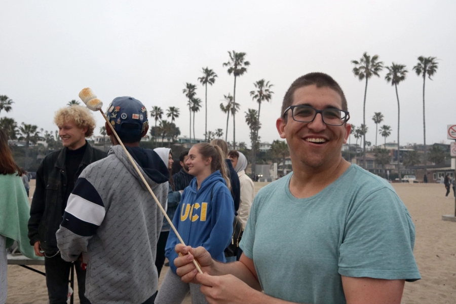 Boy holding a stick.