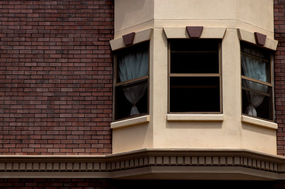 Red brick wall and balcony.