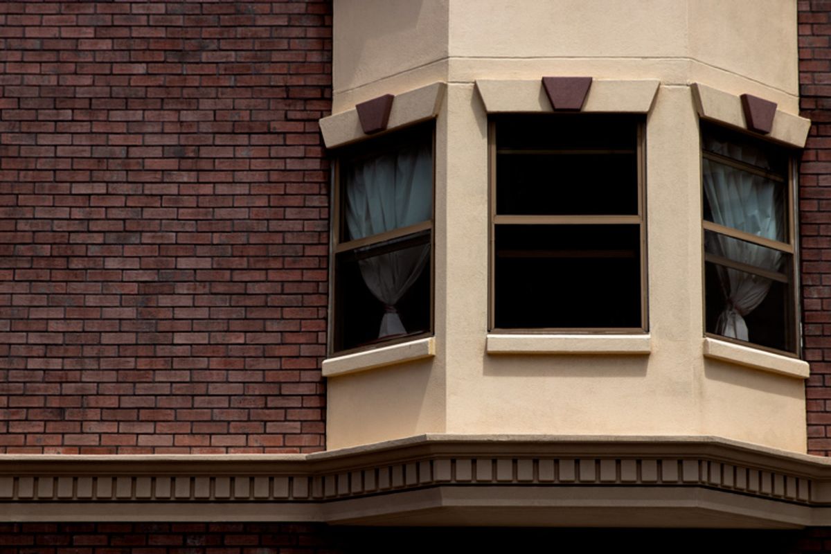 Red brick wall and balcony.