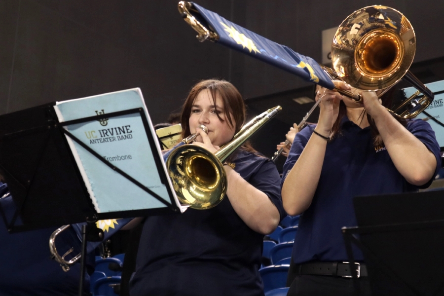 Two girls playing trombone.