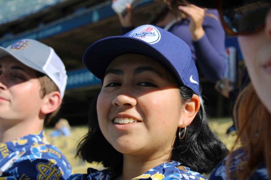 Mexican girl smiles at camera.