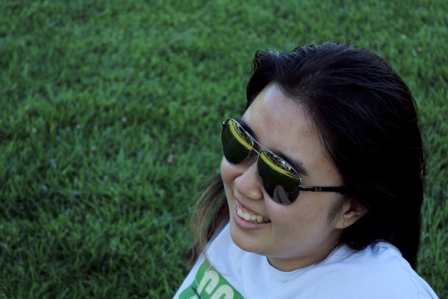 Asian girl looks to the left.
