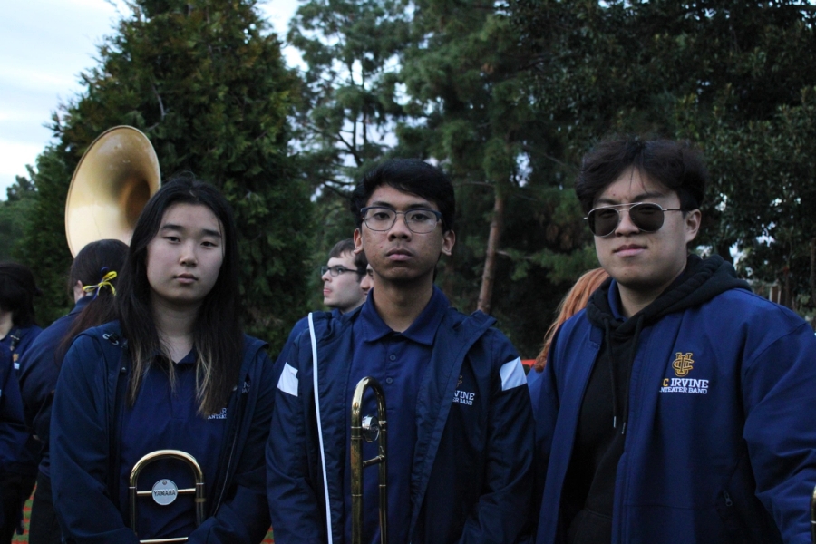 Three serious trombones.
