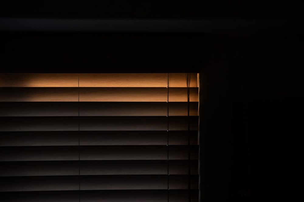 Partially illuminated window.