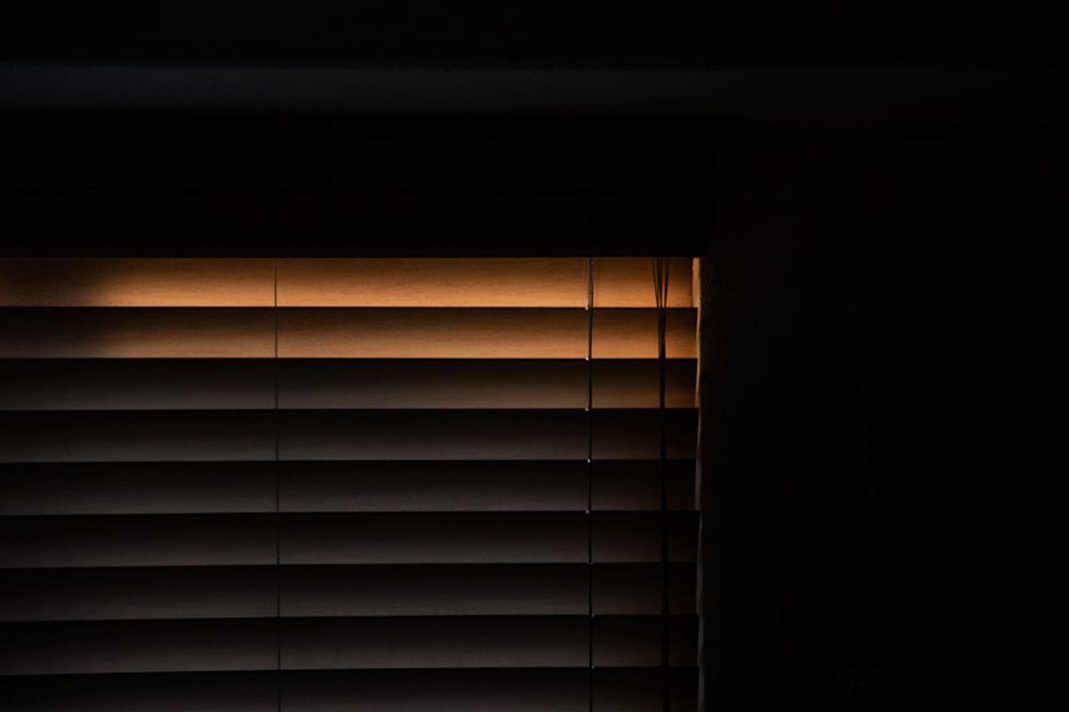 Partially illuminated window.