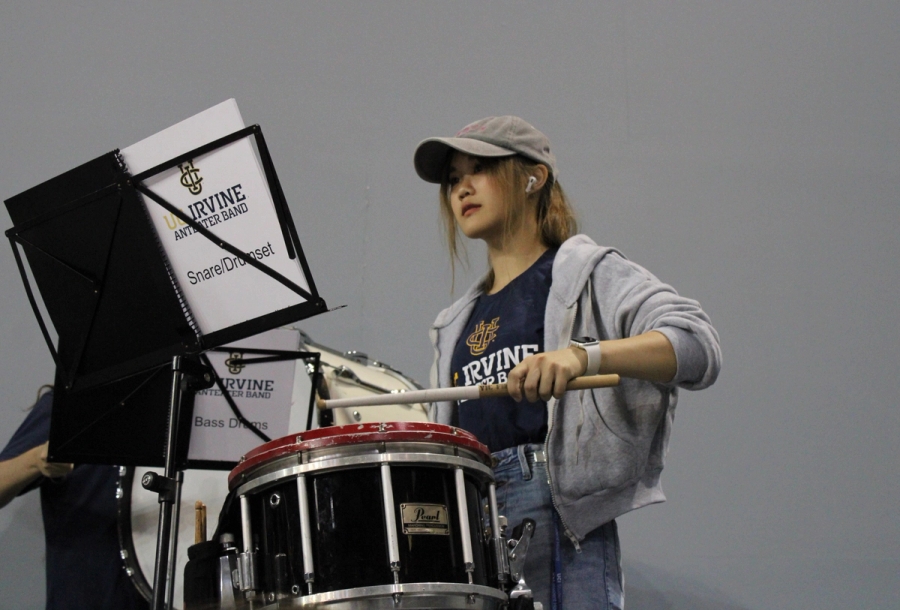 Girl playing the snare.