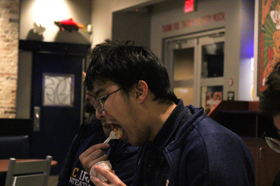 Man eating food.