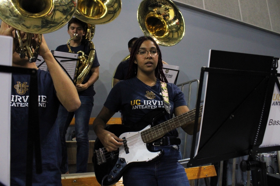 Girl playing the bass.