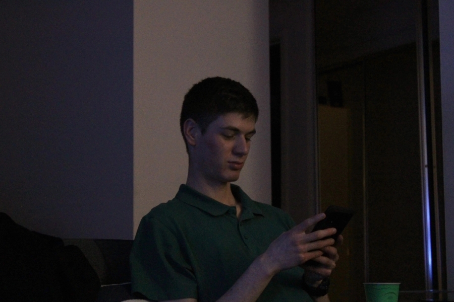Boy looking at his phone.
