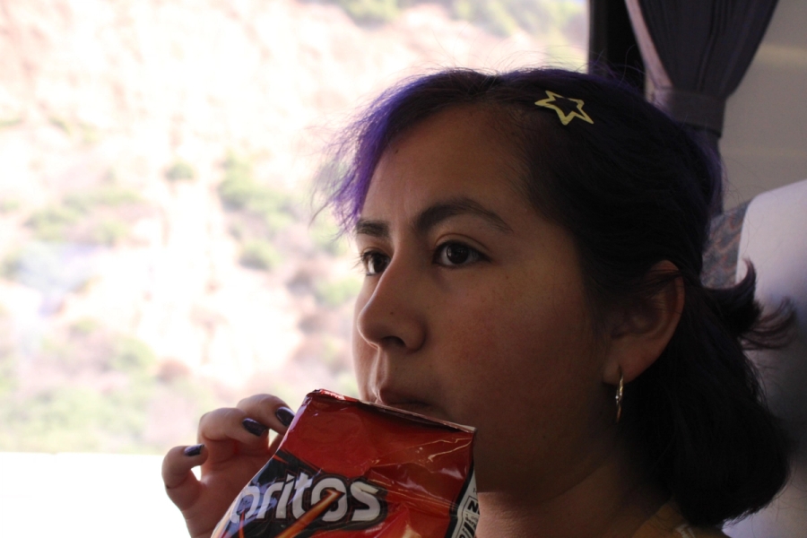 Girl eating chips.