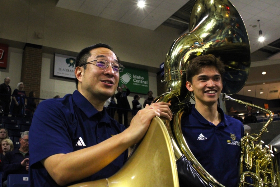 Tubas watch the game.