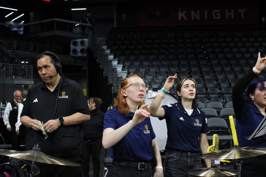 Percussion section holding zots up.
