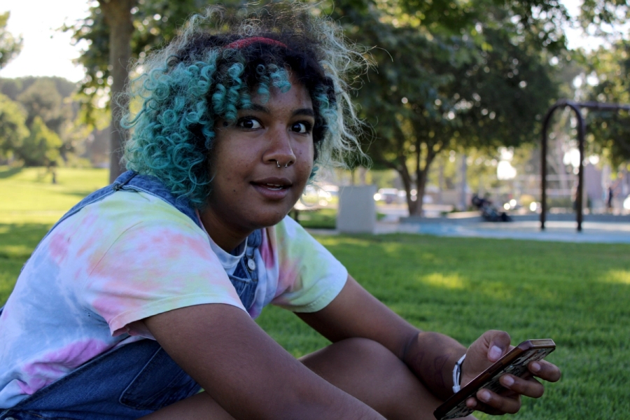 Mexican girl looks at camera.