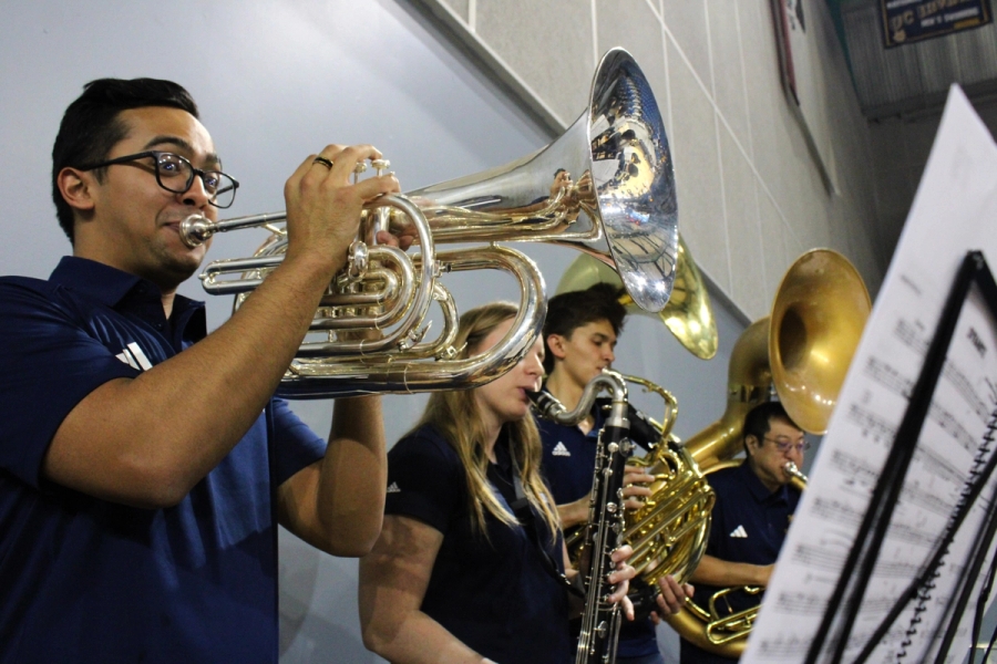 Low reeds/brass playing.
