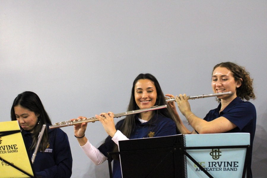 Flutes staring at the music.