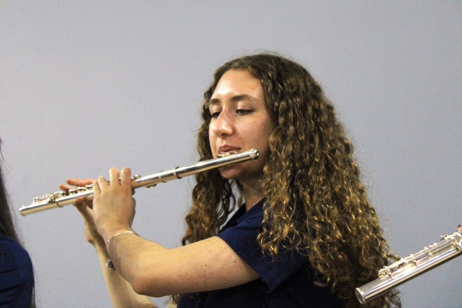Girl playing the flute.