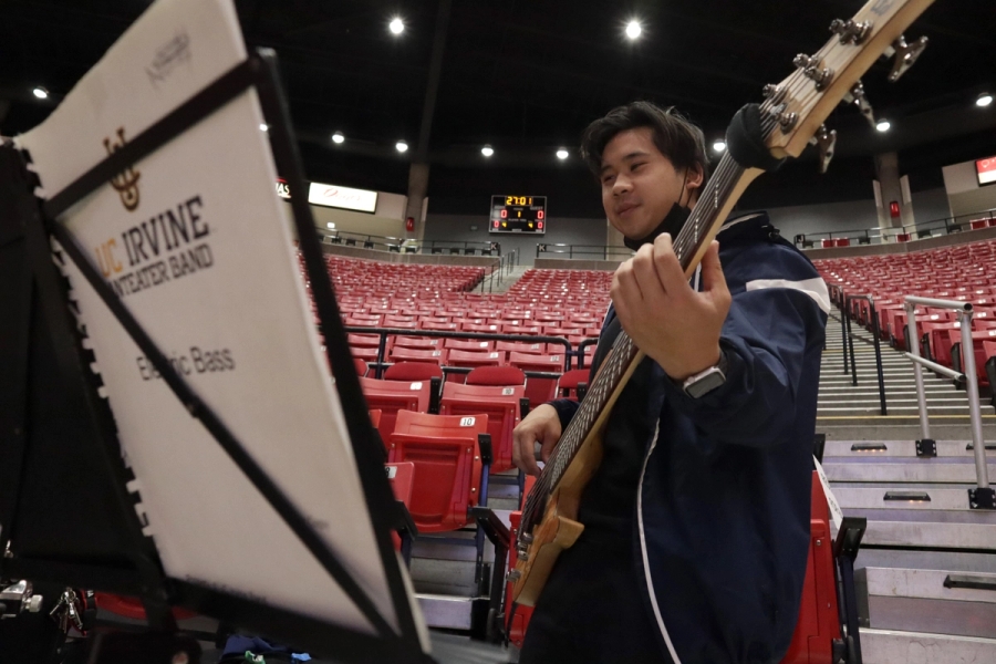 Boy playing the bass.
