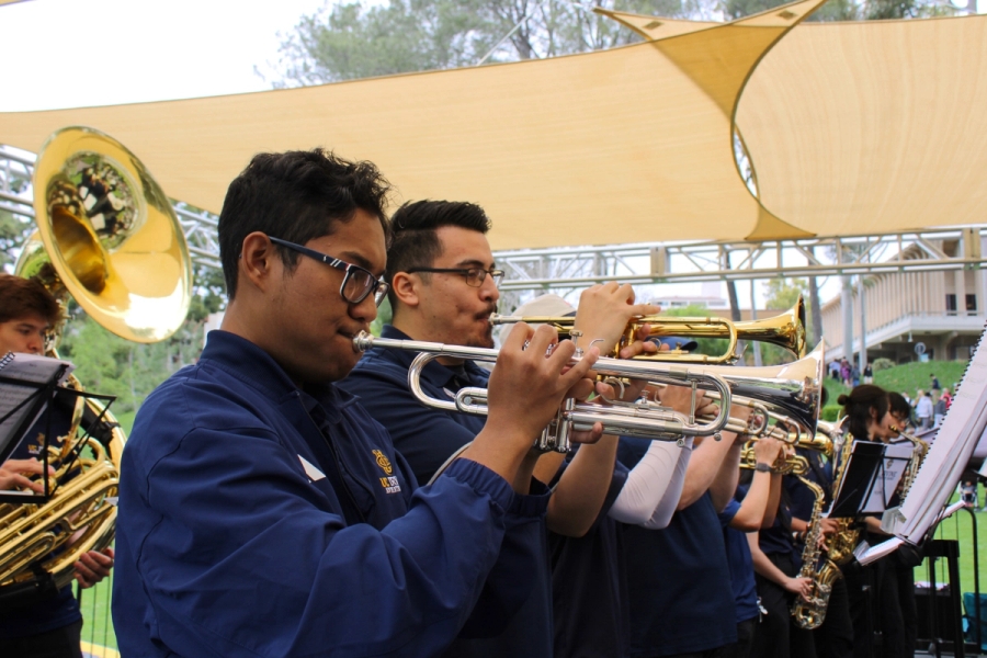Side POV of trumpets playing.