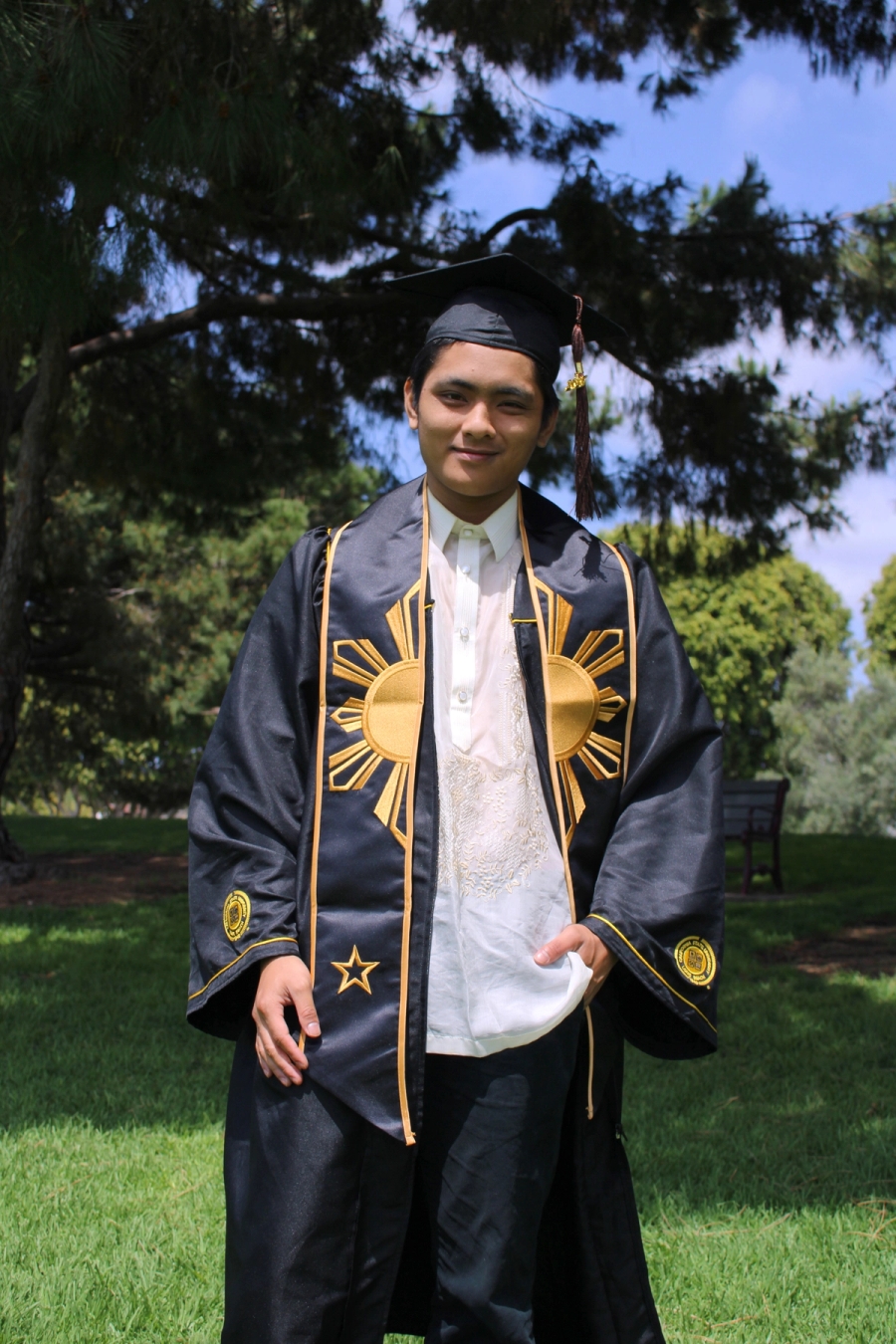 Man in Filipino grad fit.