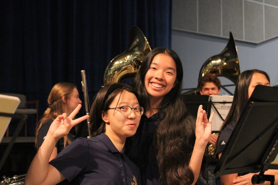 Two flutes pose for the camera.