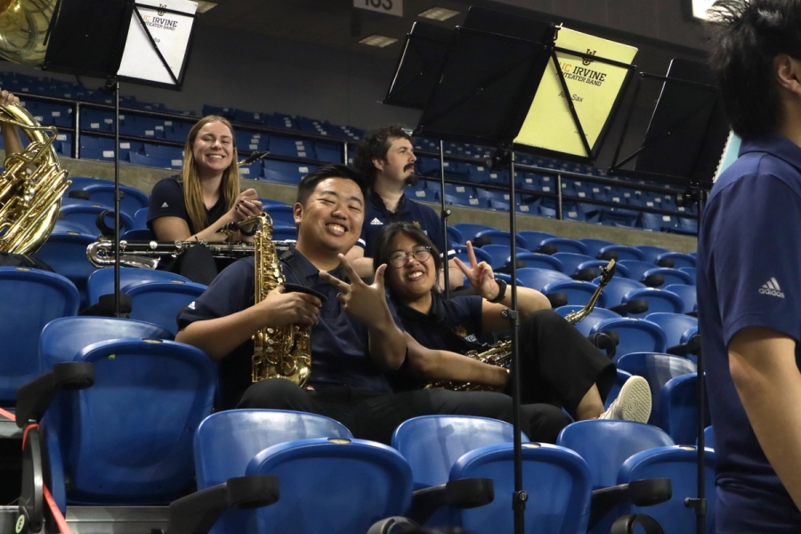 Alto saxes smiling.